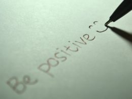 be-positive-written-on-paper-smiley-face-pen-on-paper-iSpeak